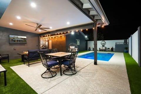Covered area out back poolside.