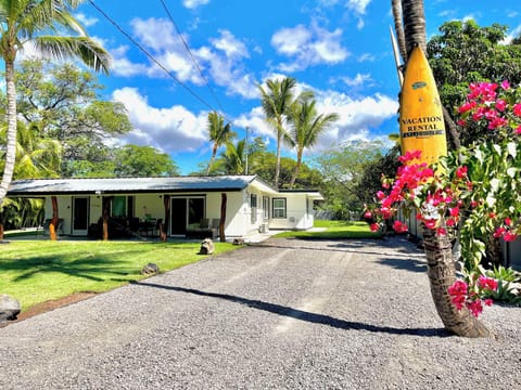 Well-kept beach house at end of Puako with large surrounding yard