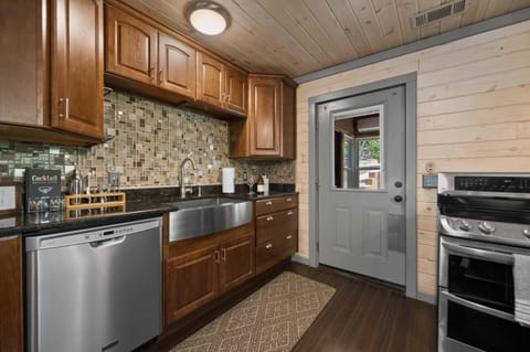 The door in the kitchen leads to a sunroom!