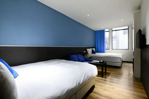 Quadruple Room | Down comforters, soundproofing, free WiFi, bed sheets