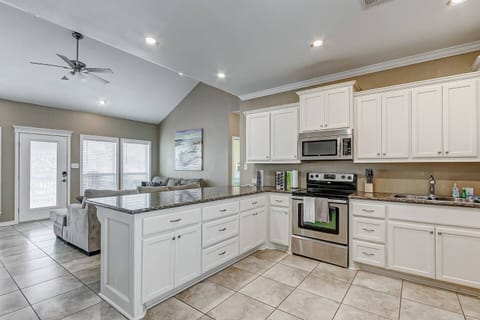 The fully stocked kitchen includes a coffee maker and a blender for smoothies or margaritas