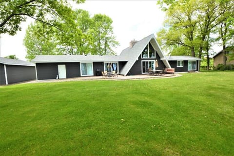 an expansive yard w lakeside patio