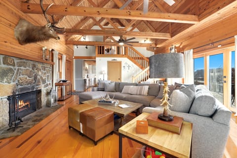 Spacious living room with wood-burning fireplace