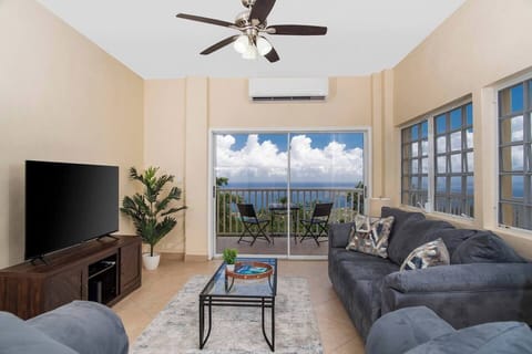 The living room is an inviting, comfortable space to relax and gather together while playing cards or watching your favorite shows on the large 58” Smart TV with access to subscription channels and Dish Network.  