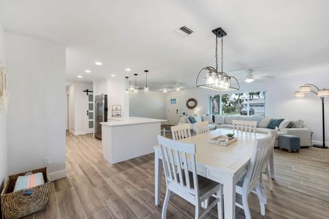 Bright and airy flow from kitchen to dining—perfect for morning coffee or unwinding after a day on the water