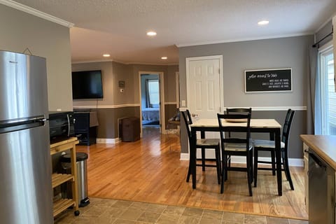 Dining open to living area and kitchen.