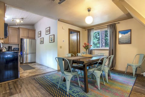 Dining Area - galley kitchen & door leading to 3/4 bathroom.