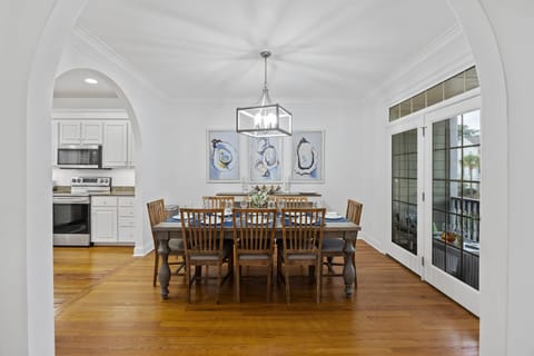 Dining table for 8 guests with additional high top table for 3