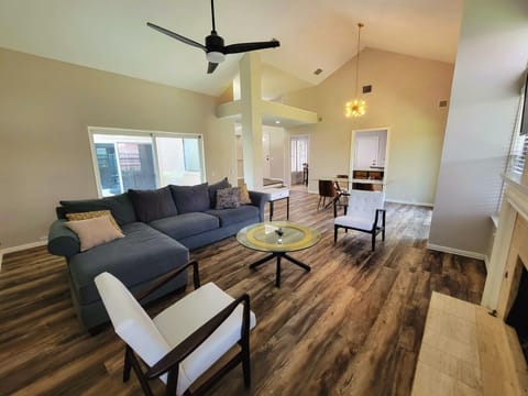 Soaring ceilings, tons of natural light, 2 sliding storm doors lead to backyard.