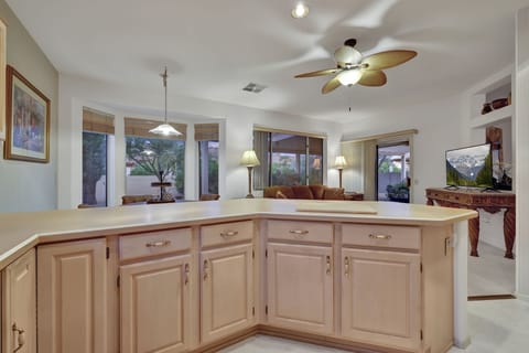 full size well stocked kitchen looking into the Arizona room