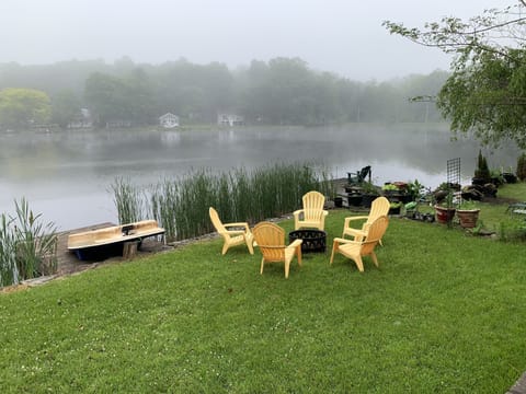 Lower tier back yard with lake at dawn.