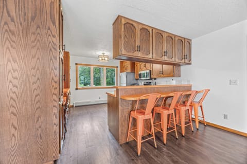 Extra bar seating, great view of the large yard