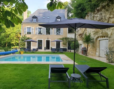 Outdoor pool, a heated pool, sun loungers