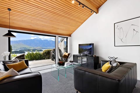 Living Room: Stunning vistas await from this stylish haven, featuring sleek furnishings and modern decor!