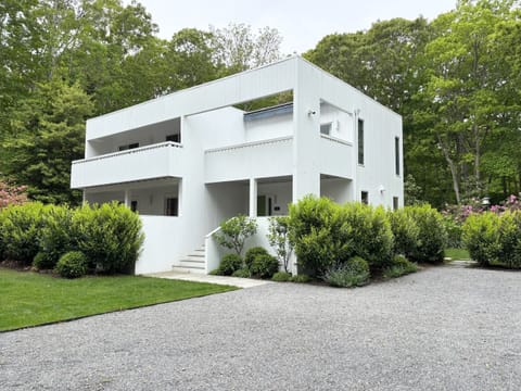Newly renovated contemporary home with mature landscaping, large driveway.