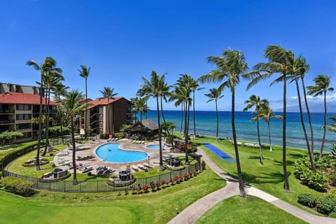 The view from the Lanai! One of two pool areas with 6 community grills.