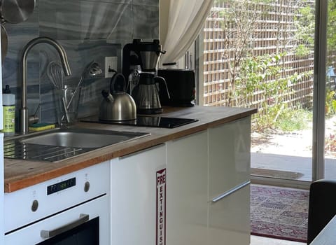 Kitchenette with basic kitchen necessities ~