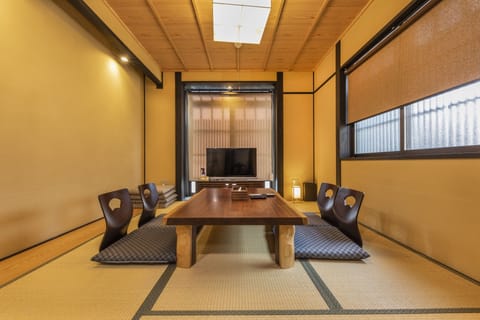 City Townhome | Living area | Flat-screen TV