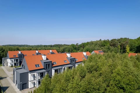 The building is close to charming beach.