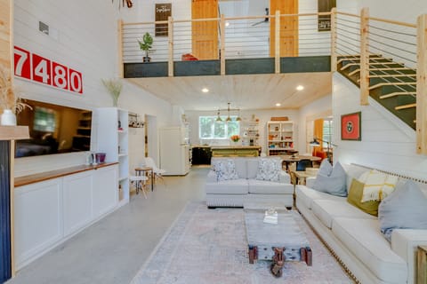 Open concept living, dining, kitchen and 24' ceilings.  Home is 2,160 square ft!