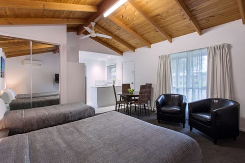 Desk, blackout drapes, iron/ironing board, free cribs/infant beds
