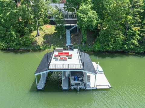 Amazing dock with party deck, double slip, swim platform & easy in/out ladder 