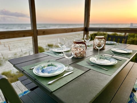 Sip coffee or a cocktail or share a meal with the soothing ocean as your background.