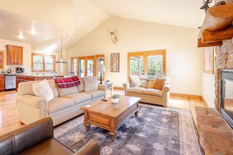 Open concept family room/dining area/kitchen.