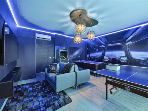 Galaxy Themed Game Room with Ping Pong, Air Hockey, Multi-Arcade Game, and Flat Screen TVs