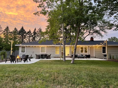 Huge 1000 sq. ft. patio with cafe lighting and Solo Stove fire pit.