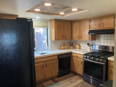 Full kitchen with gas range.