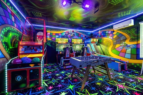 Arcade-Hoop fever basketball, air hockey, dual nascar racers, skee-ball,foosball