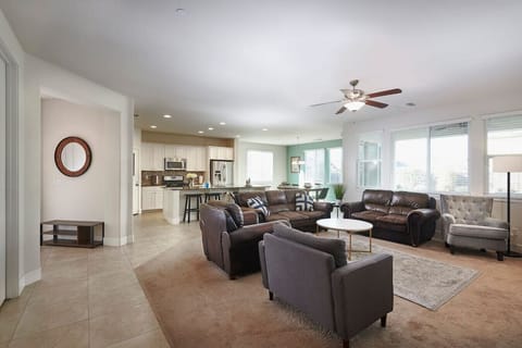 Cozy living room with 55" TV and Roku.