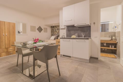 Apartment | Private kitchen | Fridge, stovetop, cookware/dishes/utensils