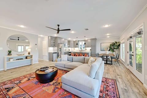 The living area offers plush seating and an open floor layout