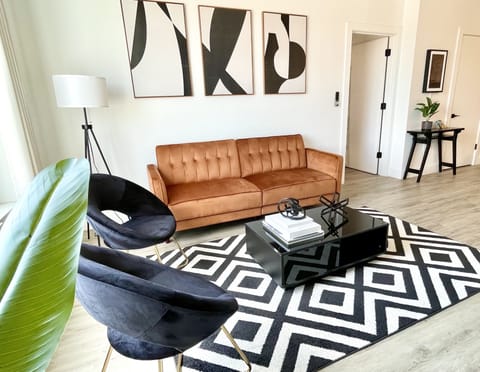Contemporary Livingroom:
- 65" Smart TV with Roku
- Sleeper Sofa
- City View