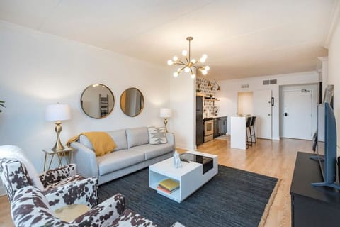 Living room with a Queen pullout couch. Smart TV with with YouTube TV for cable. Queen air mattress also available. Plenty of seating plus a couple board games!