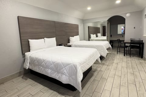 Apartment, Non Smoking (Double Queen Bed) | Iron/ironing board, free WiFi, bed sheets
