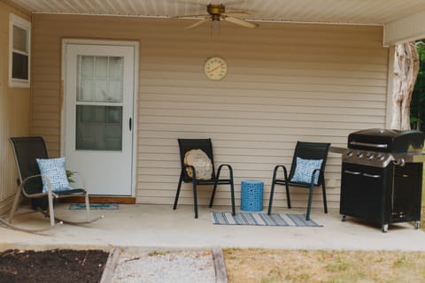 Cook on the back porch with our 4 burner grill, propane tank included.