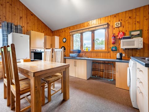 Table, Cabinetry, Property, Furniture, Window, Wood, Interior Design, Chair, Desk, Flooring