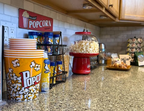 Enjoy complimentary fresh popcorn with your favorite seasoning