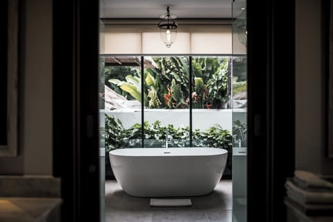 One Bedroom Retreat Luxe | Bathroom | Free toiletries, hair dryer, towels