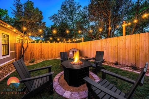 Your very own private yard with fire pit and dog house