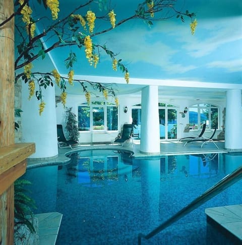 Indoor pool, outdoor pool, open 9:00 AM to 7:00 PM, sun loungers