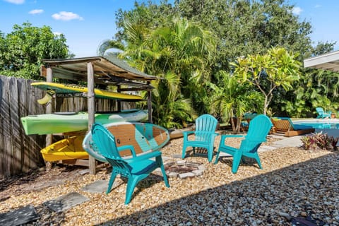 Kayaks, paddle boards, and fire pit