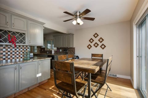 Don't miss a beat while you cook, entertain and enjoy a meal in this open floor plan.