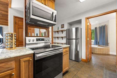 Fully equipped kitchen with modern appliances and lots of countertop space