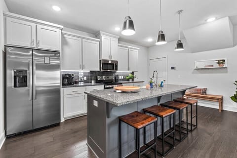 In the center of our kitchen, you'll see our large, granite-top island.