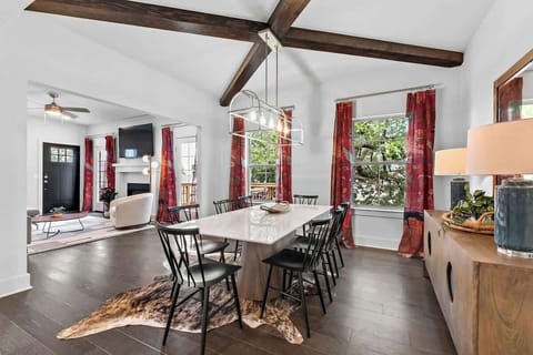 Open concept living room, kitchen and dining area on the main level of the house.