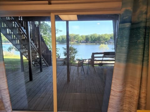 Lower level family room with slider to deck and landing to beach.